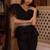 Black solid georgette v-neck ruffle top & flared pant co-ord set for women