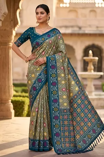 Green patola silk saree with zari weaving meenakari patola design