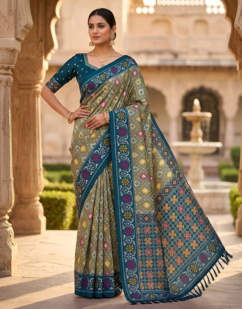 Green patola silk saree with zari weaving meenakari patola design