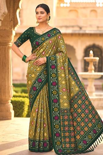 Green patola silk saree with zari weaving  meenakari patola design