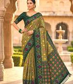 Green patola silk saree with zari weaving  meenakari patola design