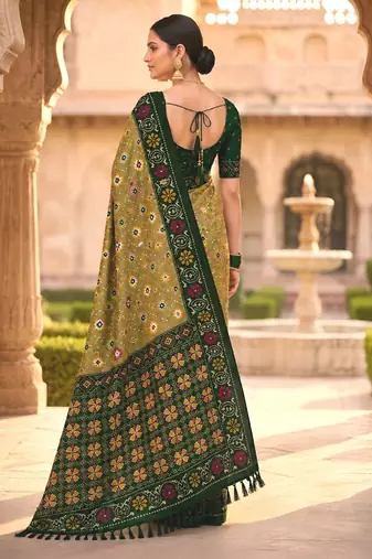 Green patola silk saree with zari weaving  meenakari patola design