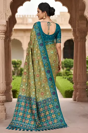 Green patola silk saree with zari weaving meenakari patola design