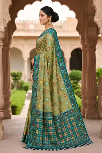 Green patola silk saree with zari weaving meenakari patola design