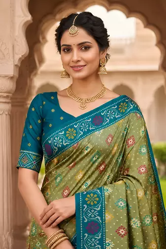 Green patola silk saree with zari weaving meenakari patola design