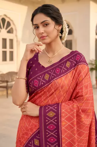 Peach patola silk saree with zari weaving meenakari patola design