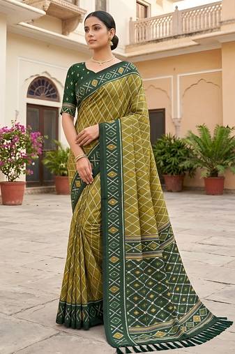 Green patola silk saree with zari weaving meenakari patola design