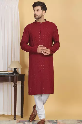 Red color embroidered kurta set with chickenkari work sequins highlights