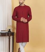 Red color embroidered kurta set with chickenkari work sequins highlights