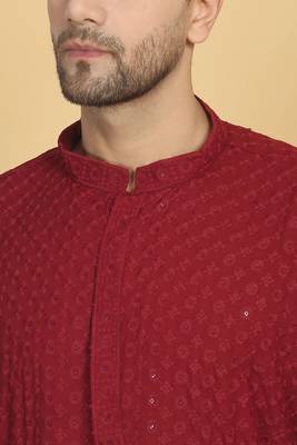 Red color embroidered kurta set with chickenkari work sequins highlights 2