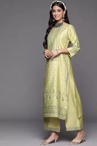 Women green floral printed liva kurta with palazzos & with dupatta