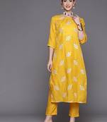 Women mustard yellow & white embroidered sequinned kurta with trousers