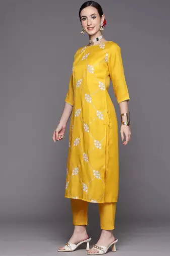 Women mustard yellow & white embroidered sequinned kurta with trousers
