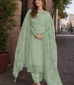 Green heavy natural crepe semi stitched suit with embroidery & zarkhan work