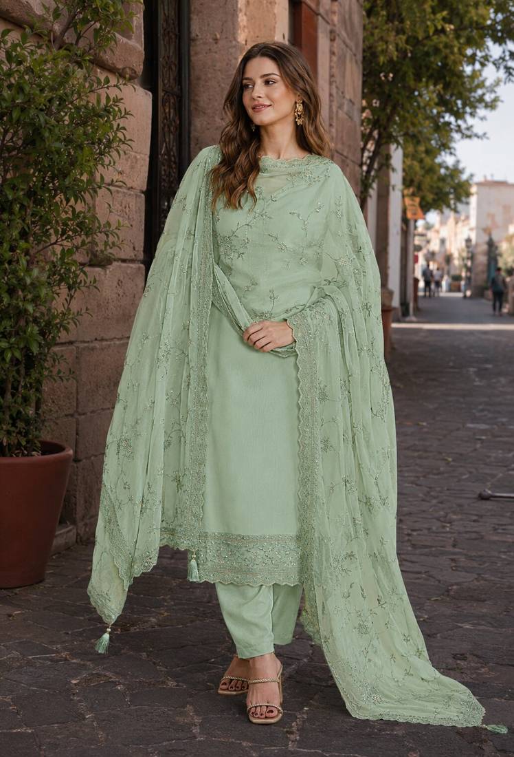 Green heavy natural crepe semi stitched suit with embroidery & zarkhan work