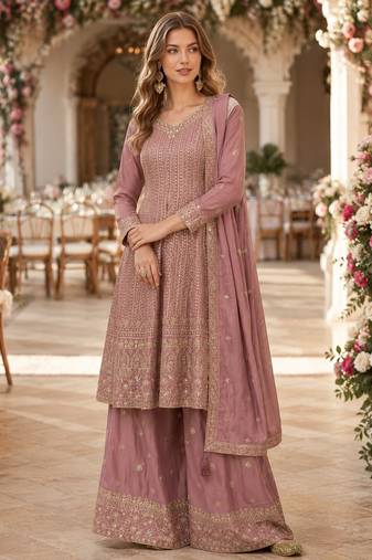 Peach heavy fox georgette free size stitched suit with sequin work