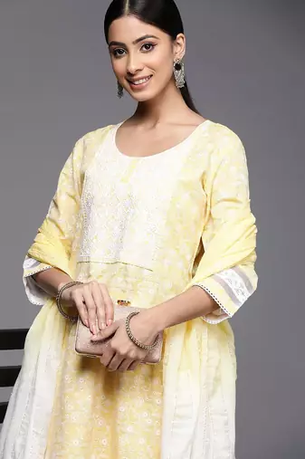 Women yellow embroidered thread work kurta with trousers & dupatta