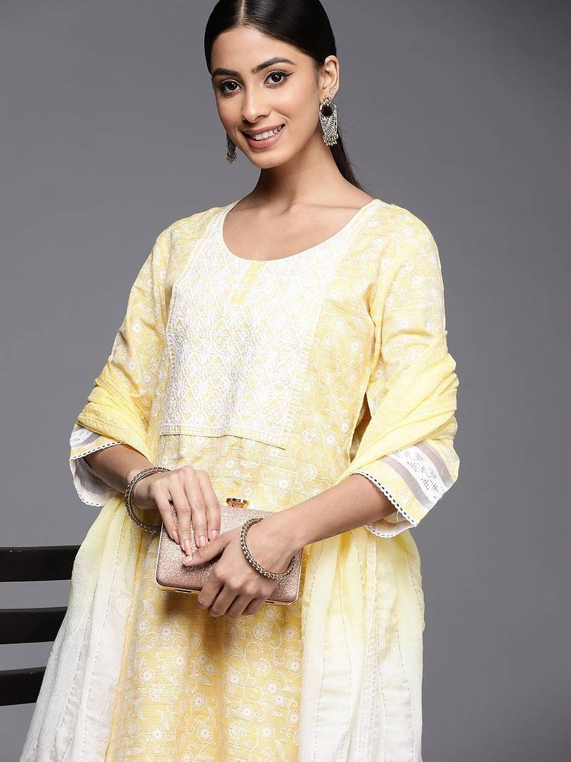 Women yellow embroidered thread work kurta with trousers & dupatta
