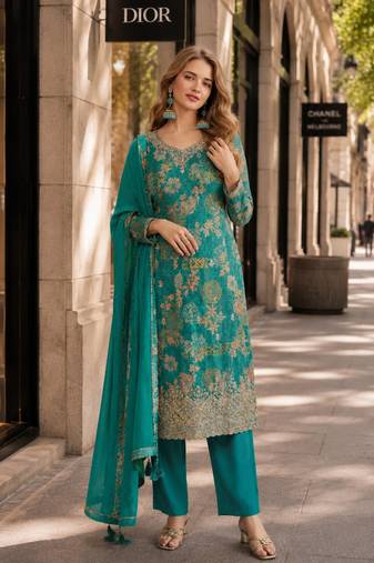 Teal green chinon suit with multi digital printed work