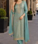 Sky blue viscose lotus simmer semi stitched suit with jacquard work