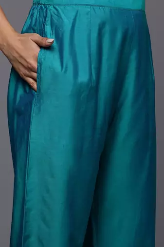 Women teal floral embroidered regular thread work kurta with trousers & with dupatta
