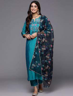 Women teal floral embroidered thread work kurta with trousers & with dupatta 1