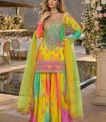 Yellow chinon free size stitched suit with embroidery & sequence work