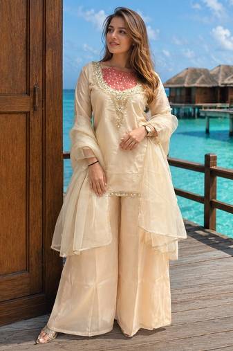 Cream roman shimmer kurti set with handwork & moti work