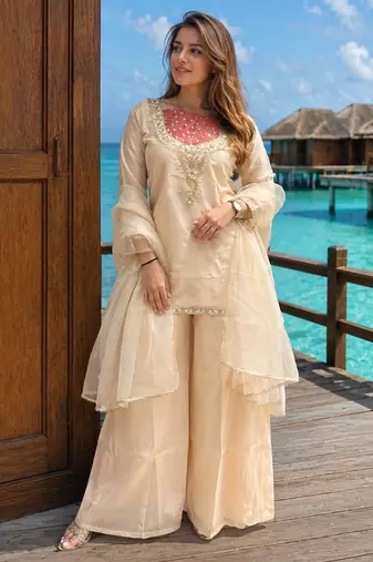 Cream roman shimmer kurti set with handwork & moti work