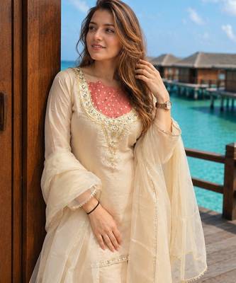 Cream roman shimmer kurti set with handwork & moti work 2
