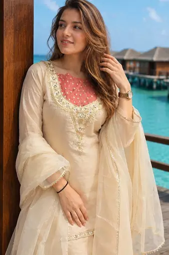 Cream roman shimmer kurti set with handwork & moti work