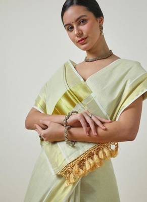 cream zari work tissue kasavu saree 2