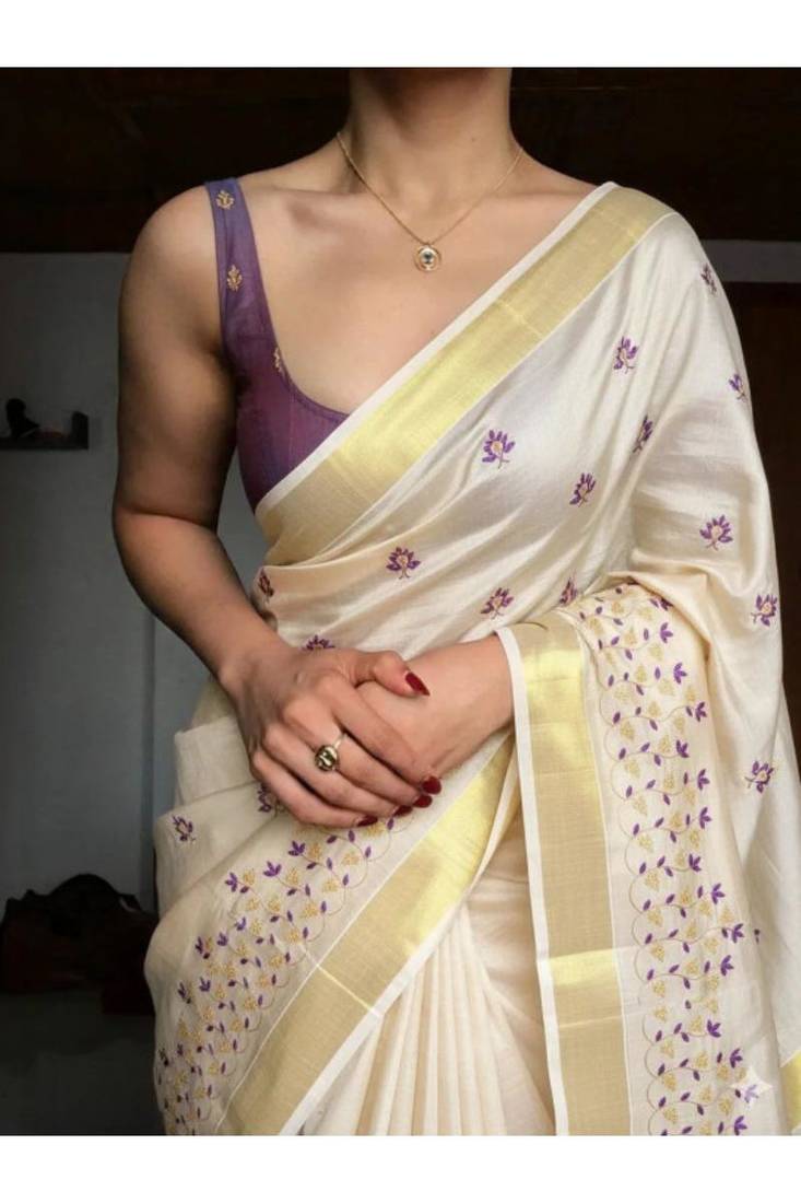 Floral embroidered tissue handloom kasavu saree