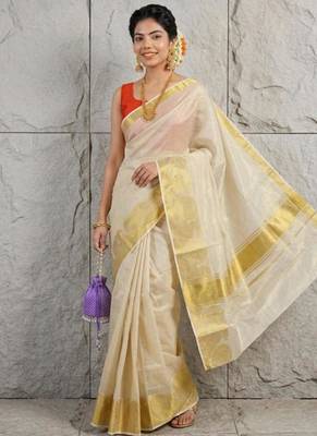 cream zari woven tissue kasavu saree with rich gold border 1