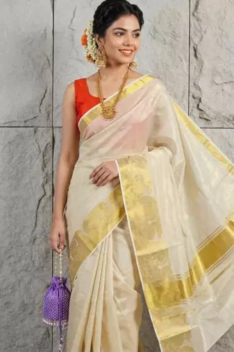 cream zari woven tissue kasavu saree with rich gold border