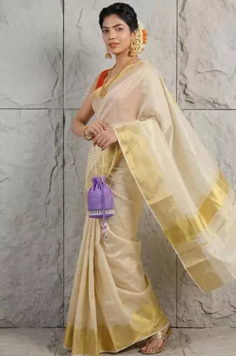 cream zari woven tissue kasavu saree with rich gold border