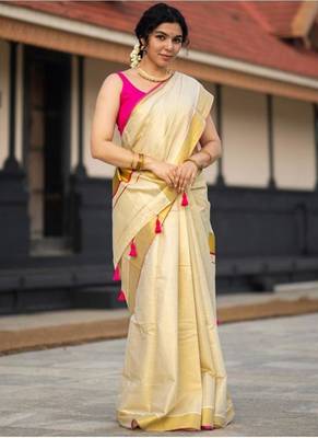 cream tissue kasavu saree with gold border & pink tassels 1