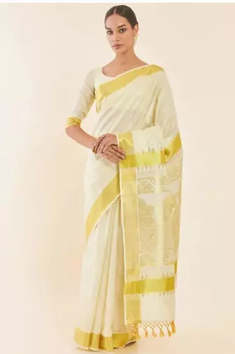 Off white paisley woven design zari tissue kasavu saree