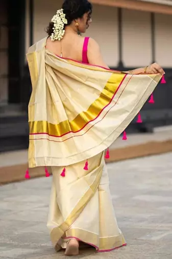 cream tissue kasavu saree with gold border & pink tassels