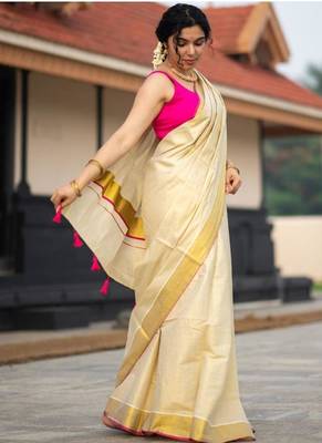 cream tissue kasavu saree with gold border & pink tassels 4