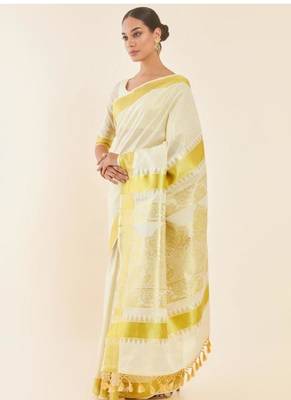 off white woven design zari tissue kasavu saree 4