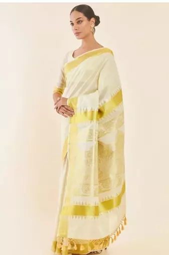 Off white paisley woven design zari tissue kasavu saree