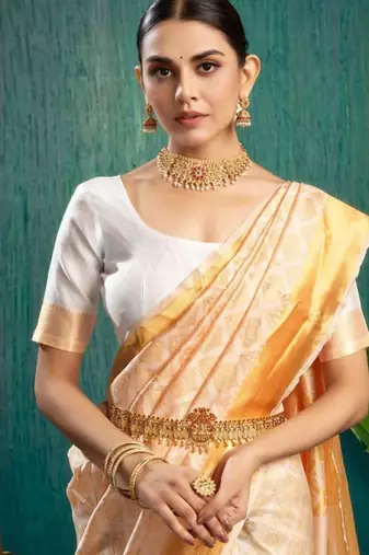 Woven design kasavu saree with zari border