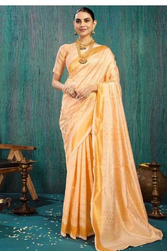 peach color gold woven kasavu saree with zari work