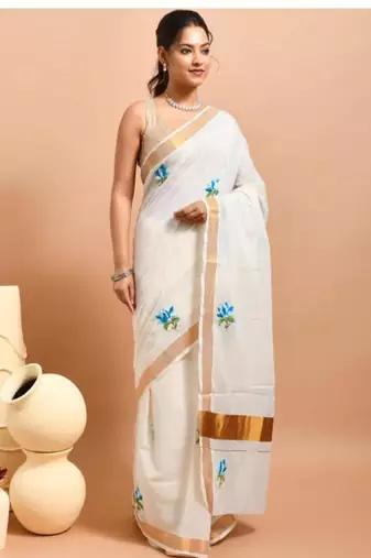 off white kasavu saree with hand embroidered blue lotus designs 
