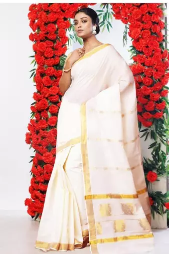 off white kasavu saree with gold zari stripe