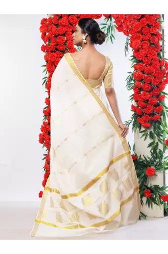 off white kasavu saree with gold zari stripe