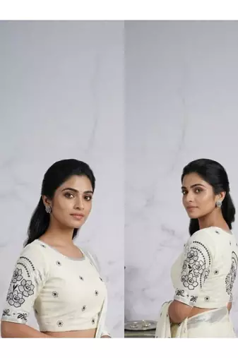 Floral embroidered pure cotton handloom kasavu saree