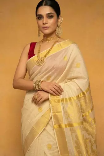 Woven design zari tissue kasavu saree