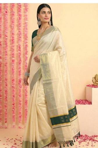 dark green tissue chathura kerala saree with zari work